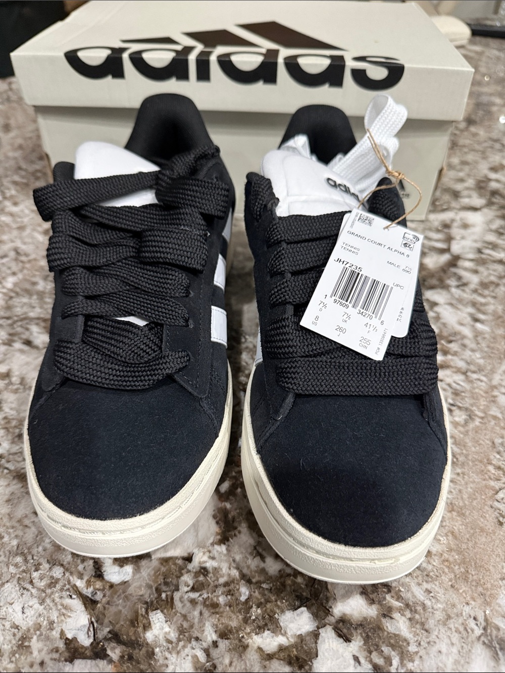 adidas women’s Black and White Low-Top Sneakers